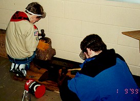 Scouts pound while metalworking